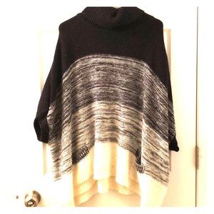 Black, gray and white poncho sweater